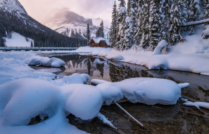 Landscape Photography at Emerald Lake, BC. The light hits the peaks behind the lodge
