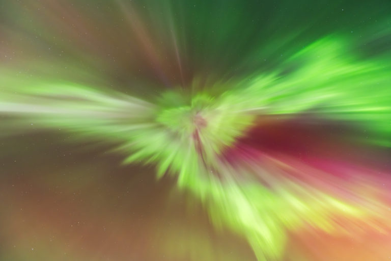 A photograph of the Aurora Borealis corona. Shaped like a bird