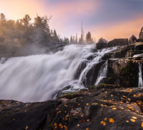 A sunrise photograph of Nistowiak Falls in northern Saskatchewan