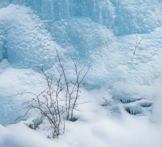 An intimate landscape photograph of the ice at Johnston Canyon