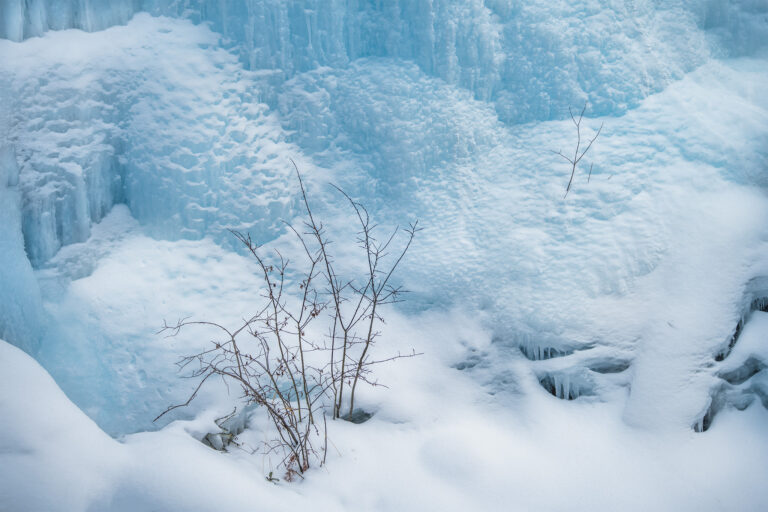 An intimate landscape photograph of the ice at Johnston Canyon